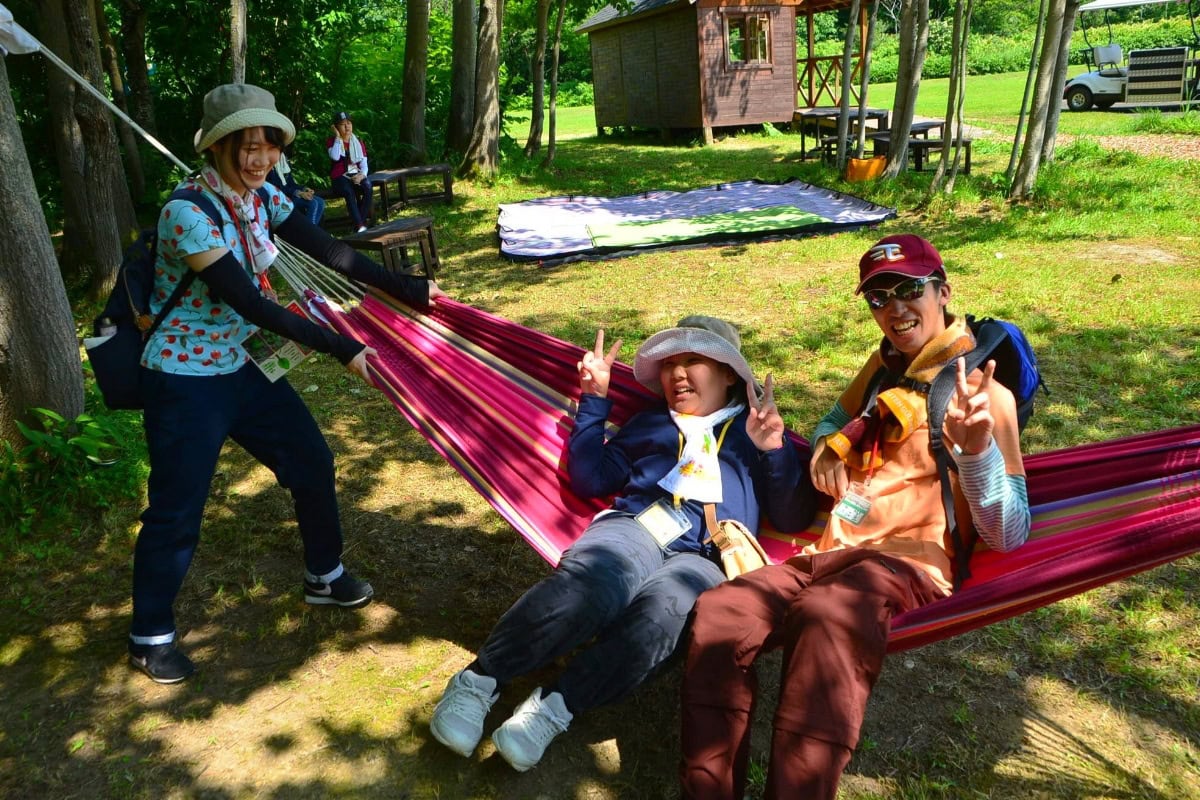 camper kicking back on a hammock